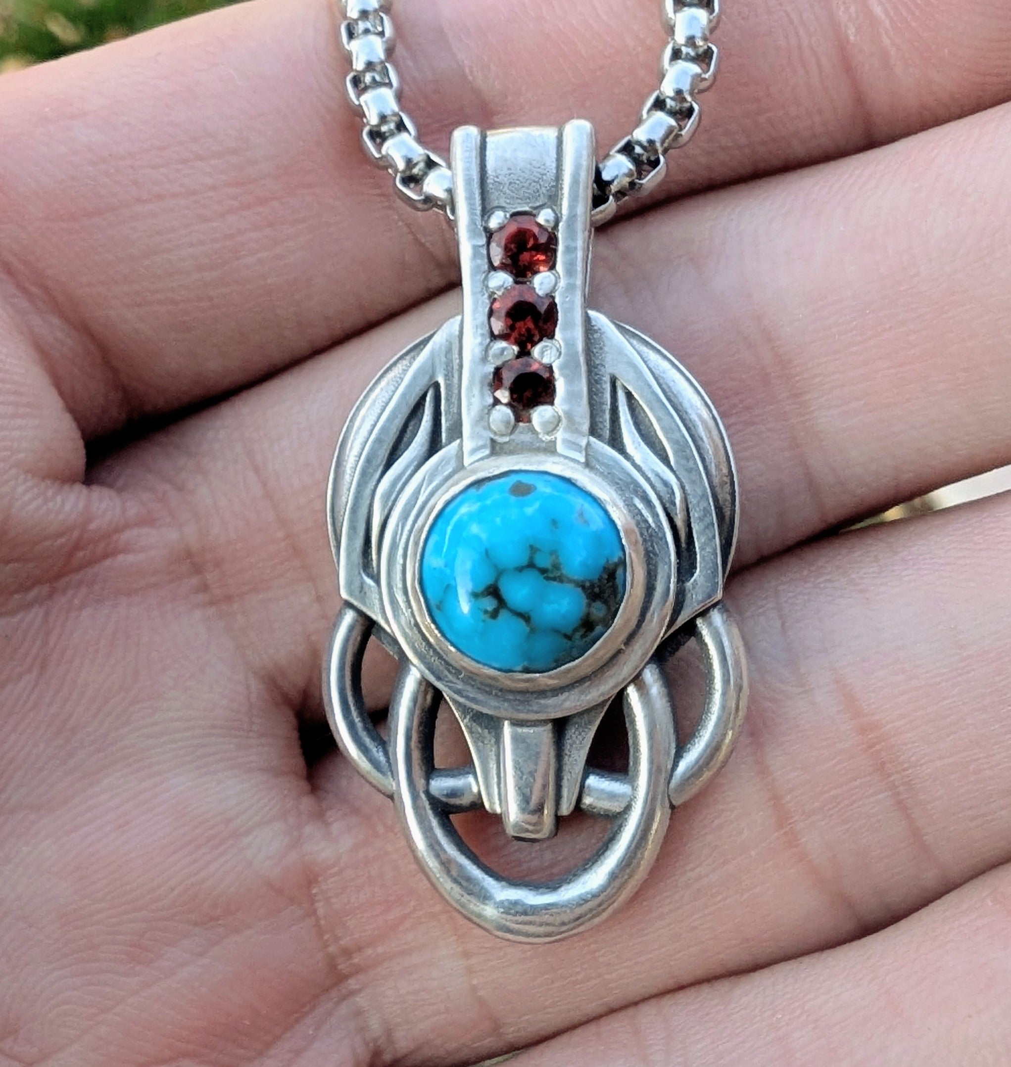 Sterling silver turquoise steal your face pendant