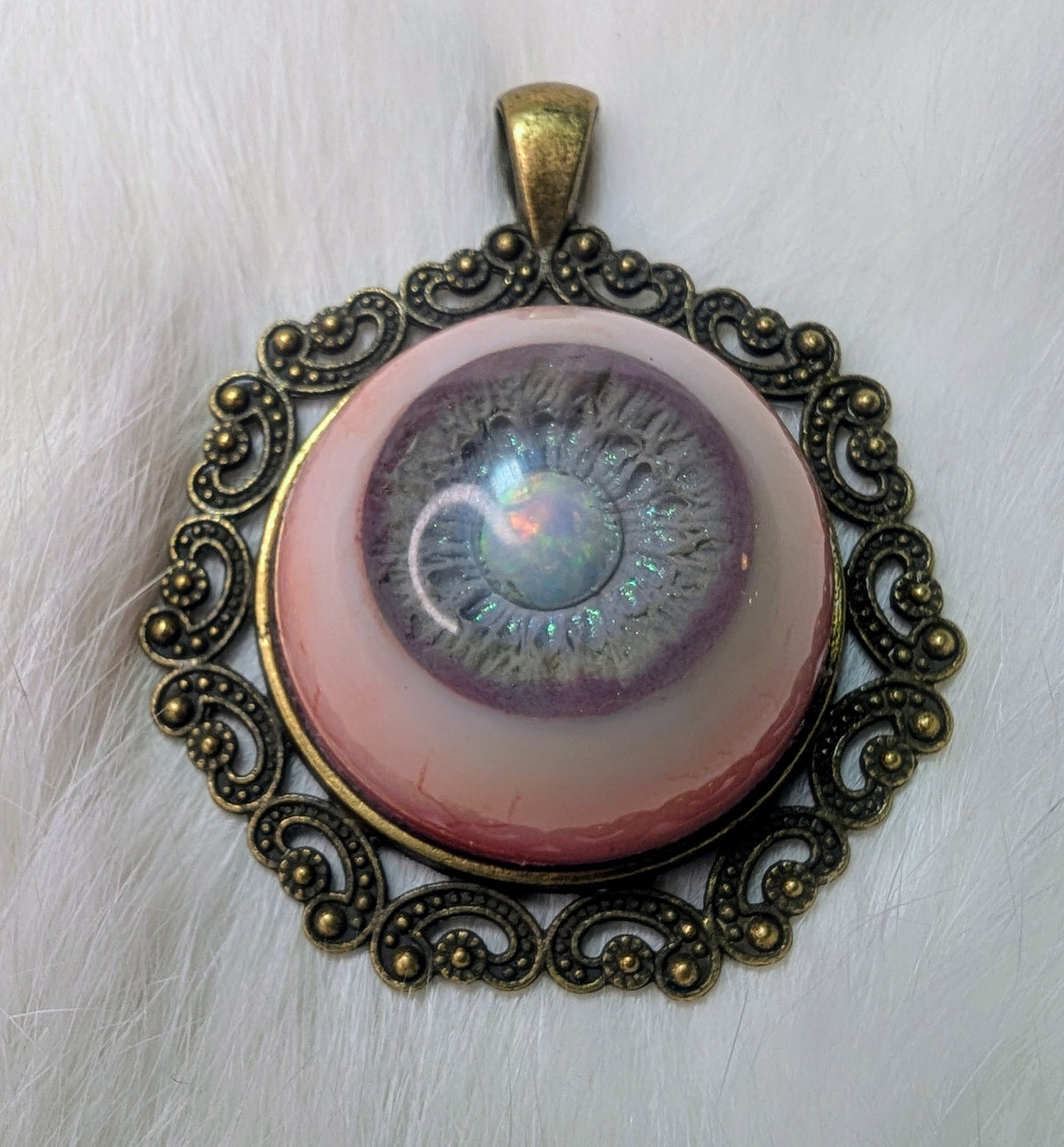Eye pendant with opal pupil