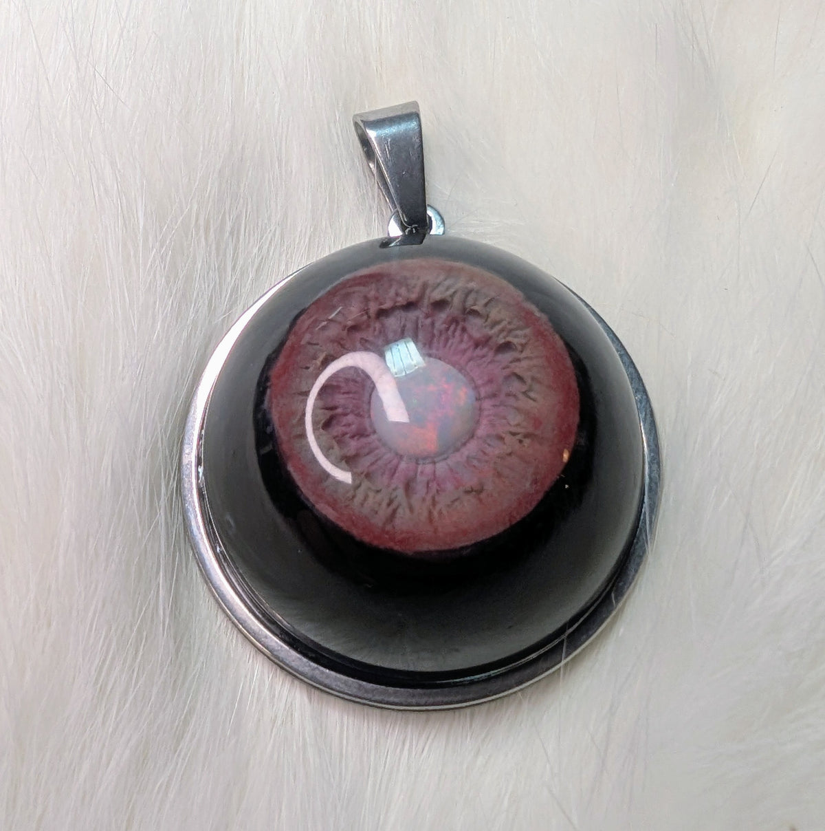 Eye pendant with opal pupil