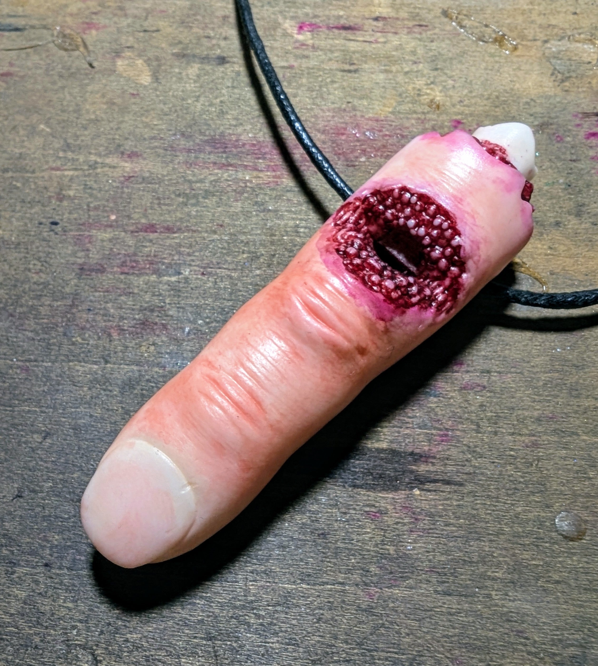 Severed finger whistle