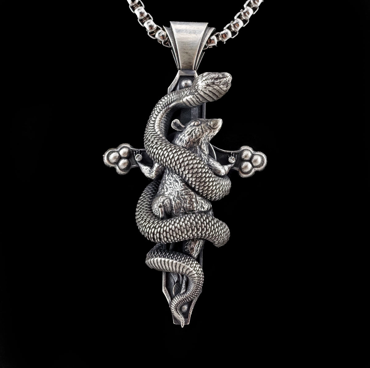 Heretics cross sterling silver pendant
